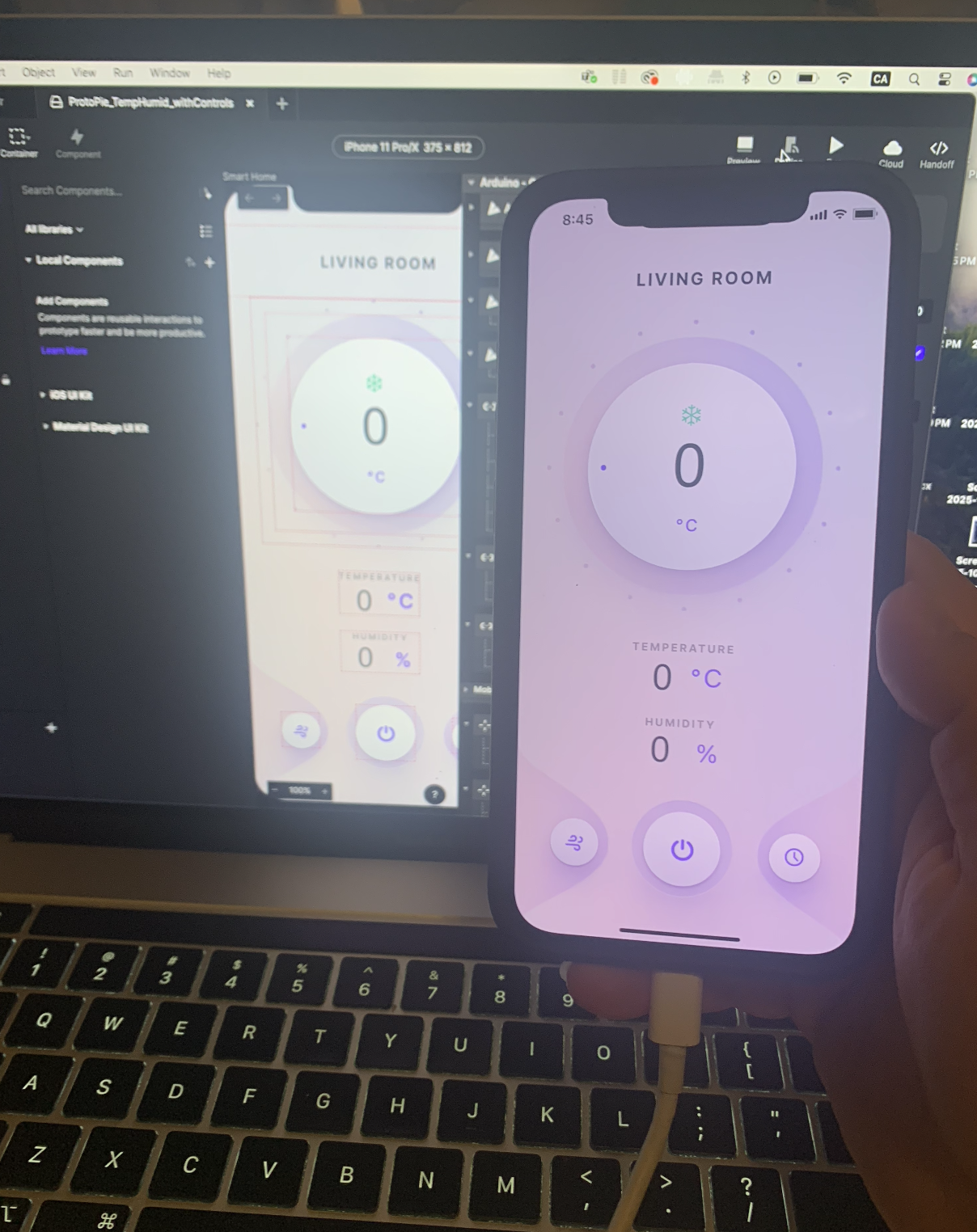 ProtoPie displays live temperature and humidity controls, linked to the phone through a USB-C connection.