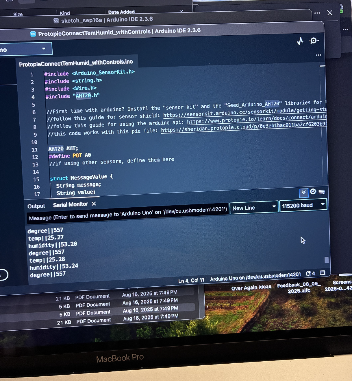 The IDE reads and displays real-time temperature data from the all-in-one sensor board.