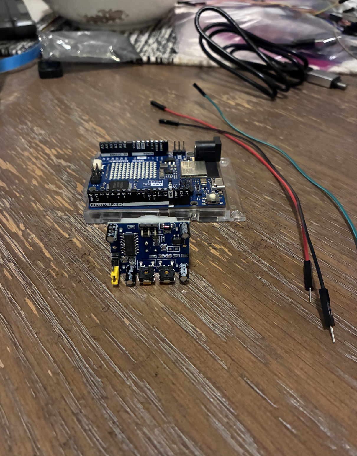 Shows the PIR sensor wiring layout and component arrangement from the rear view.